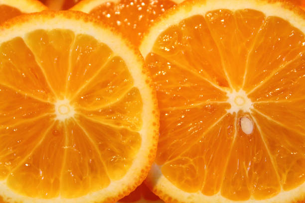 istock Fresh sliced orange. Close-up. Background. Texture. 1366748658