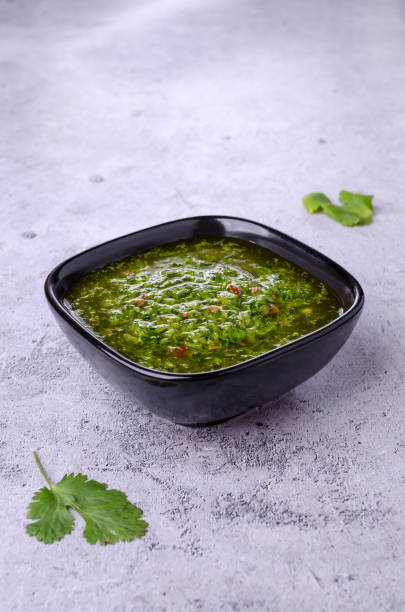 istock Green sauce in ceramic dishes 1366749435