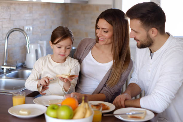istock Nice breakfast for a happy family 1366749534