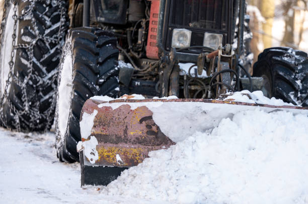 istock Tractor clearing snow from the road. 1366749710