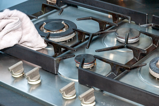 Gas Hob Stove and Grill in Professional Kitchen Restaurant