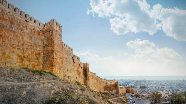 Wall of Naryn-Kala fortress View of Derbent city. Republic of Dagestan, Russia Wall of Naryn-Kala fortress View of Derbent city. Republic of Dagestan, Russia north caucasus photos stock pictures, royalty-free photos & images