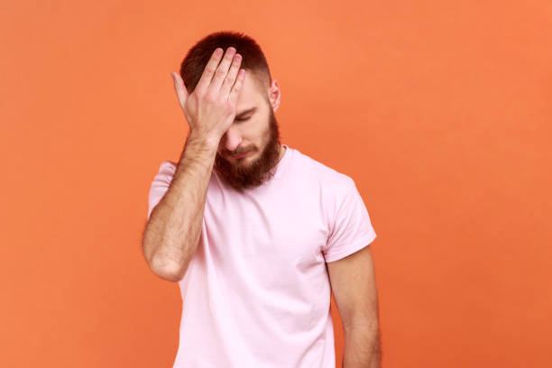 istock Man holding big clock and biting nails, nervous about delayed meeting or deadline, need hurry up. 1366752456