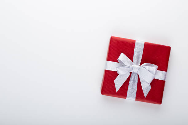 istock Gift or present box and stars confetti on color table top view. Flat lay composition for birthday, mother day or wedding. 1366757060