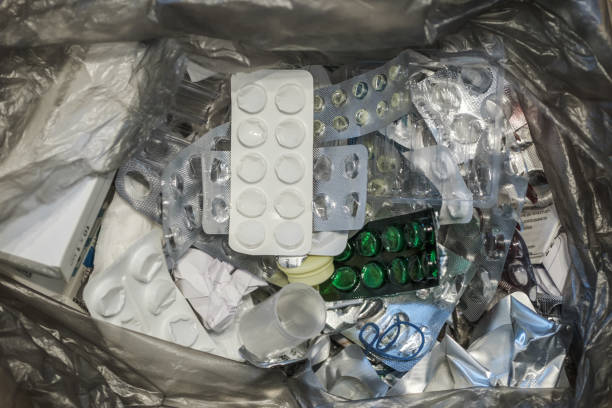 istock A garbage bag with opened packages of medicines. 1366758070