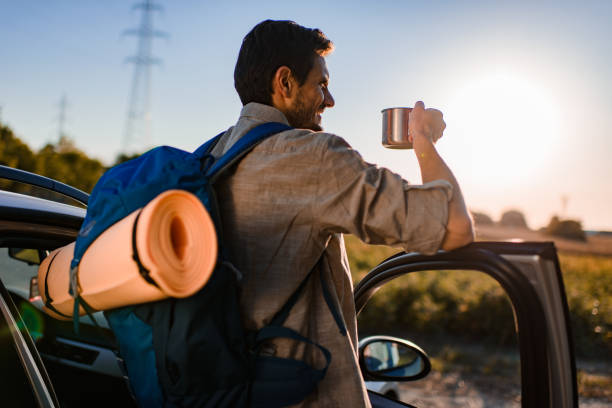 istock Young man having a break on a road trip 1366759723
