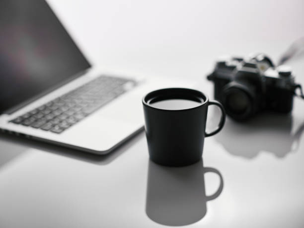 istock a photographer's desk at a coffee break 1366760081