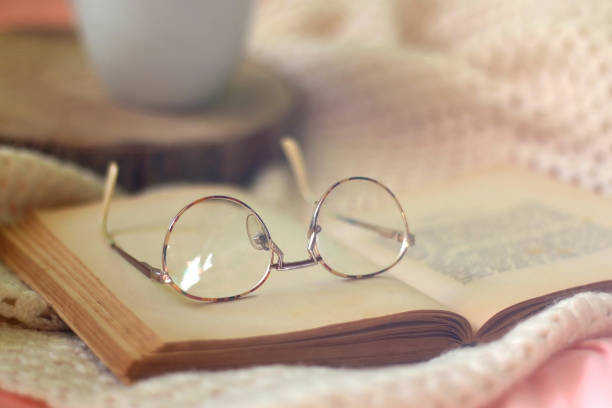 istock Mug with Cookies, Book and Glasses 1366761304