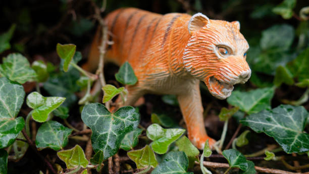 istock Children's toy tiger with open mouth. 1366763687