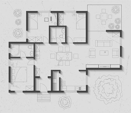 Floor plan of house, on paper background with shadows.