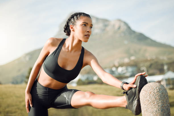 istock Shot of a young woman stretching before a run 1366766505