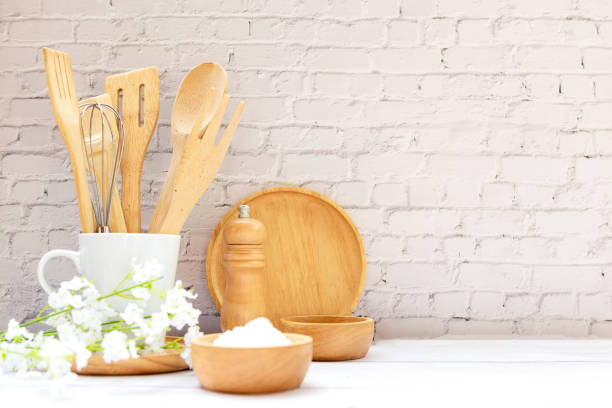 istock Kitchen tools and kitchenware utensil object on kitchen shelf wood white for healthy eat and health care life.  Wall white brick background, 1366766529