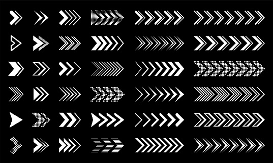 Set of white vector arrows on a black background