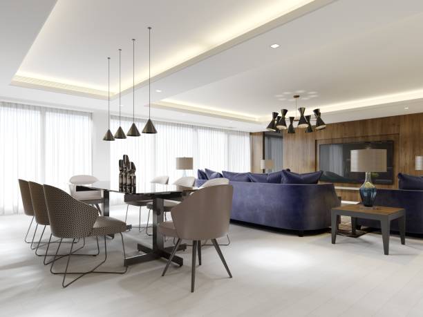 istock Studio apartment with open area living room and kitchen with dining table with wood paneling on the walls and light green and purple furniture. 1366768565