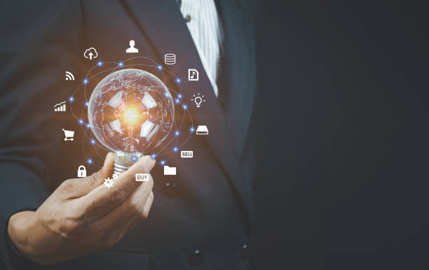 istock Man holding light bulbs, ideas of new ideas with innovative technology and creativity. 1366771833