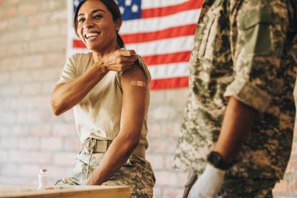 istock American servicewoman smiling happily after getting vaccinated 1366775260