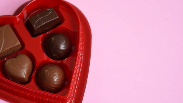 istock Valentine Chocolates with Pink Background 1366779501