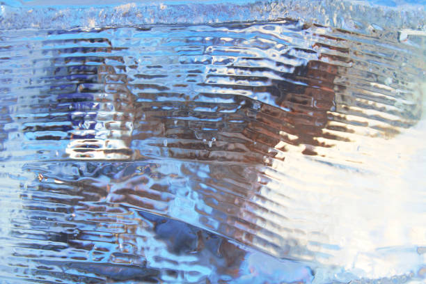 istock Beautiful blue transparent ice. Close-up. Background. Texture. 1366780490