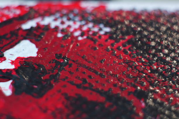 smear of paint with a palette knife on canvas in macro photography
