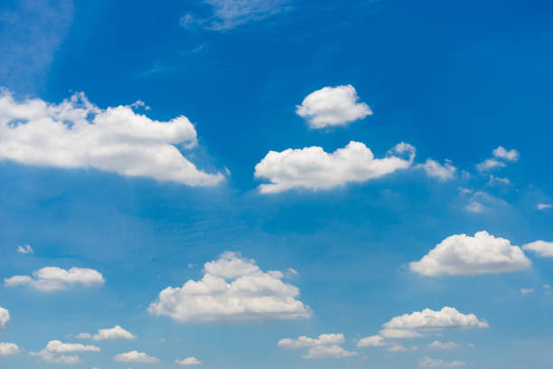istock beautiful blue sky and white fluffy cloud horizon outdoor for background. 1366783393