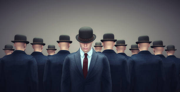 istock Man stands opposite to the crowd. 1366784599