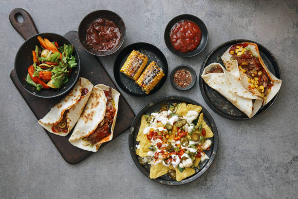 istock Mexican Slow Cooker Shredded Beef Tacos and Nachos 1366786778