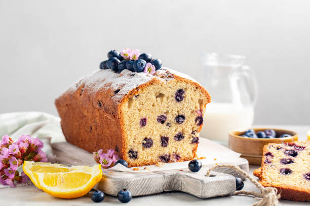 Homemade lemon blueberry cake or fruitcake. Spring breakfast. White background.