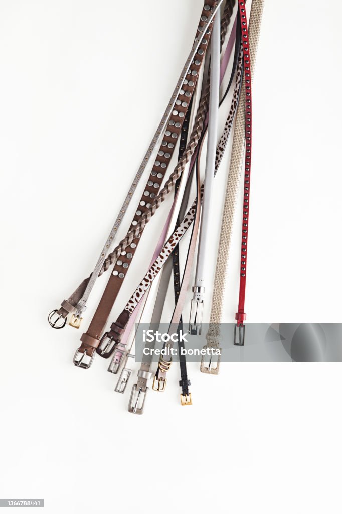 Fashionable set of belts isolated on white background Fashion Stock Photo