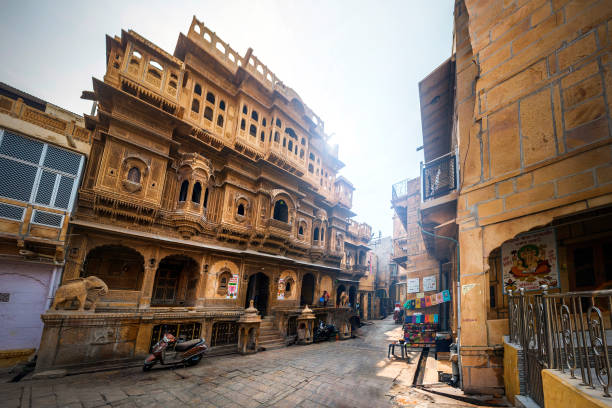 istock Jaisalmer, India - December 5, 2019: Beautiful stone building with graceful balconies and windows inside the Jaisalmer fort. UNESCO World Heritage site. 1366789751