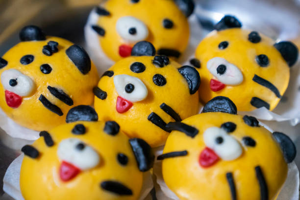 Steamed buns decorated to look like a tiger placed in a steamer, to commemorate Lunar New Year in 2022, which is the Year of the Tiger in the Chinese Zodiac.