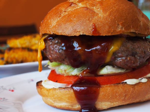 istock Delicious hamburger in the table 1366794407