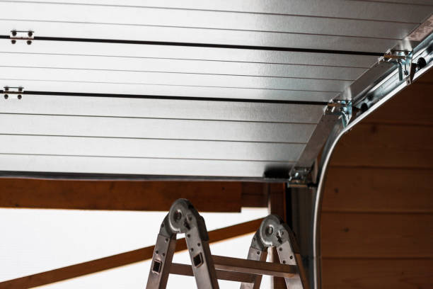 istock ladder and garage door 1366794433