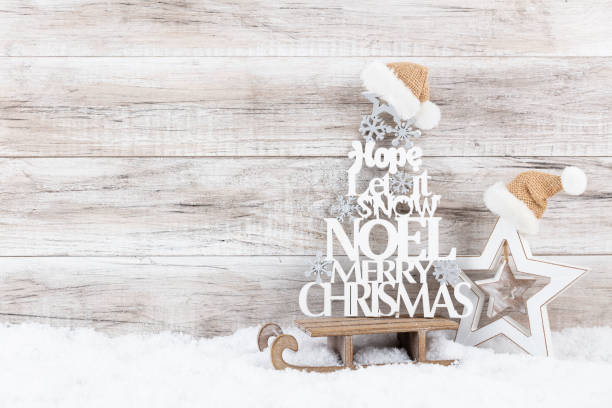 istock Christmas tree on wooden background. 1366795495