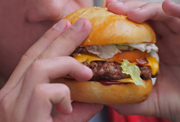 istock Delicious hamburger in the table 1366796287