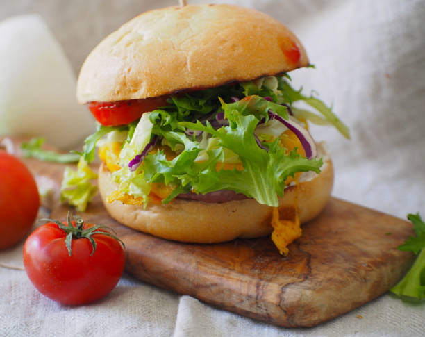 istock Delicious hamburger in the table 1366796481