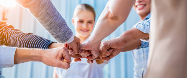 istock Panoramic Teamwork,empathy,partnership and Social connection in business join hand together concept.Hand of diverse people connecting.Power of volunteer charity work, Stack of people hand. 1366796511
