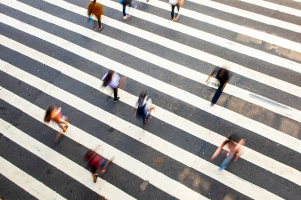 istock People in a crosswalk - motion blur - long exposure 1366797665
