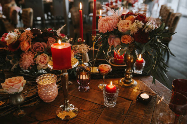 istock Romantic red table, decorated table with flowers and red candles. Luxury Christmas evening or wedding party decoration. 1366802575