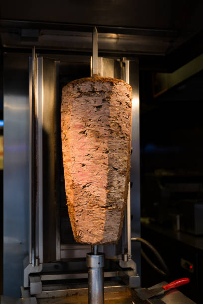 istock Turkish doner on a vertical kebab grill 1366802842