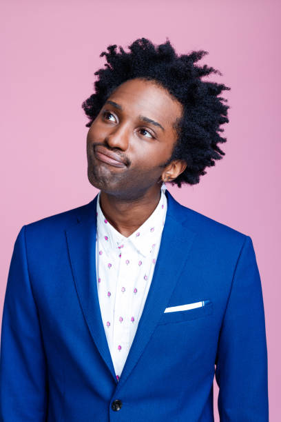 istock Portrait of confused elegant man 1366803956