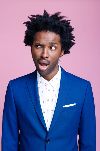 istock Portrait of confused elegant man 1366804232