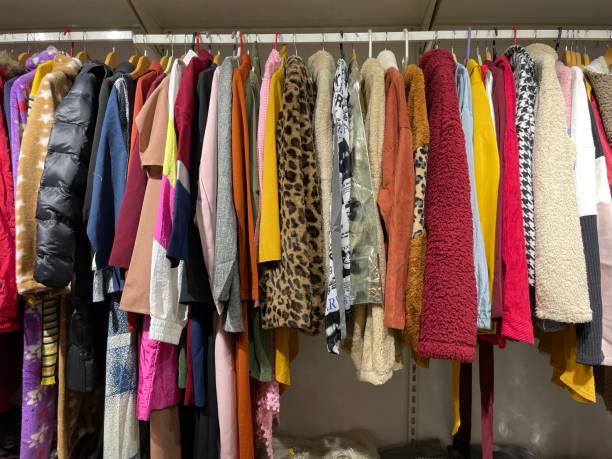 istock Collection of colourful garments hanging 1366806030