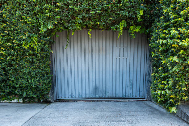 Black and yellow doors of the entrance to an industrial warehouse.  Belfast, Northern Ireland.