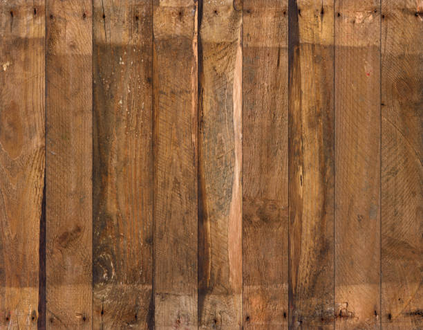 istock Vintage weathered rough planks with rusty nails background 1366811810