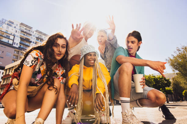 istock Vibrant young people having fun outdoors 1366813285