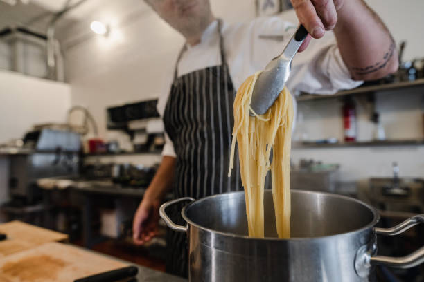 istock Chef cooking healthy food for delivery 1366813414