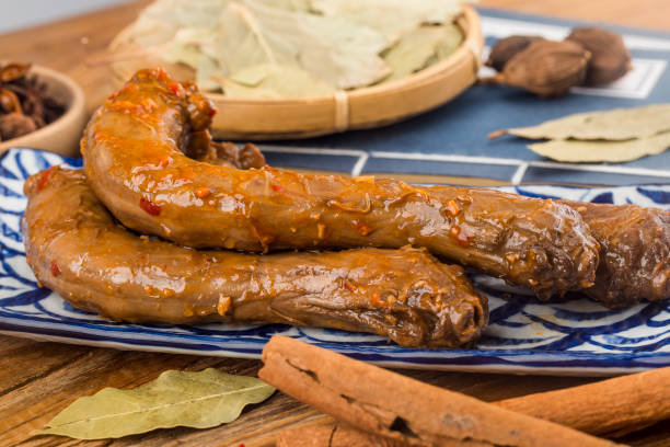 istock Delicious spiced duck neck on a plate 1366813427