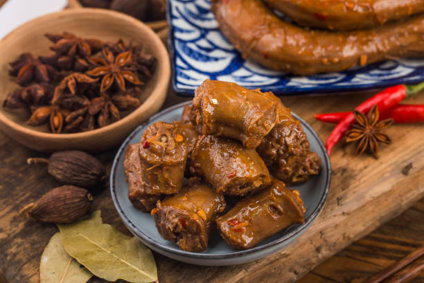 istock Delicious spiced duck neck on a plate 1366813462