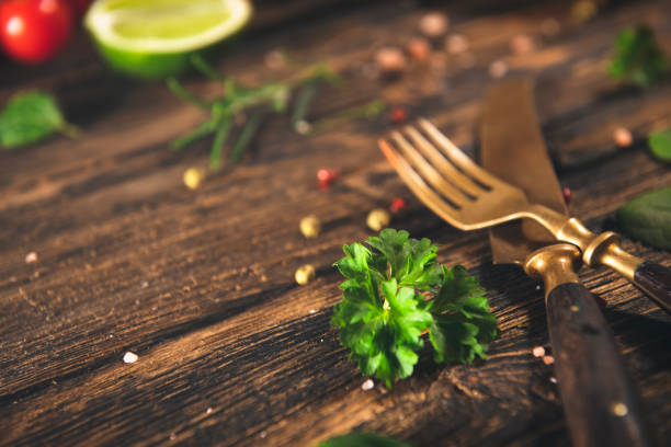 Spices and herbs on rustic wooden table with copy space
