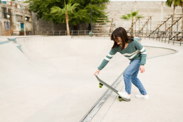 istock Centennial young woman at the skatepark 1366814184
